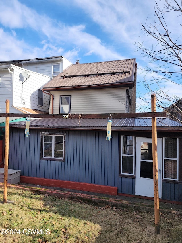 view of property exterior featuring a yard