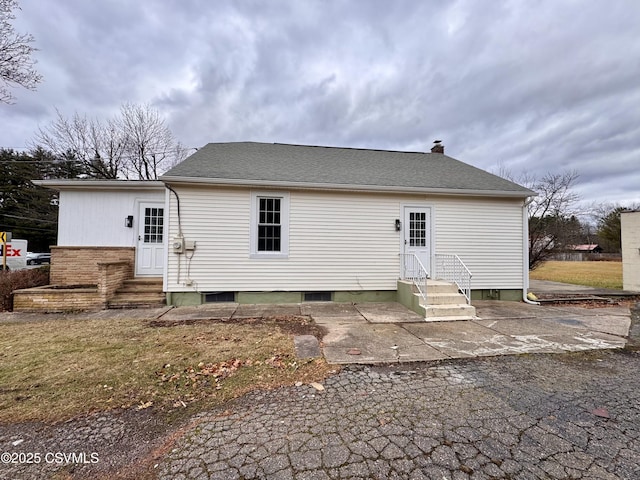 back of property featuring a patio