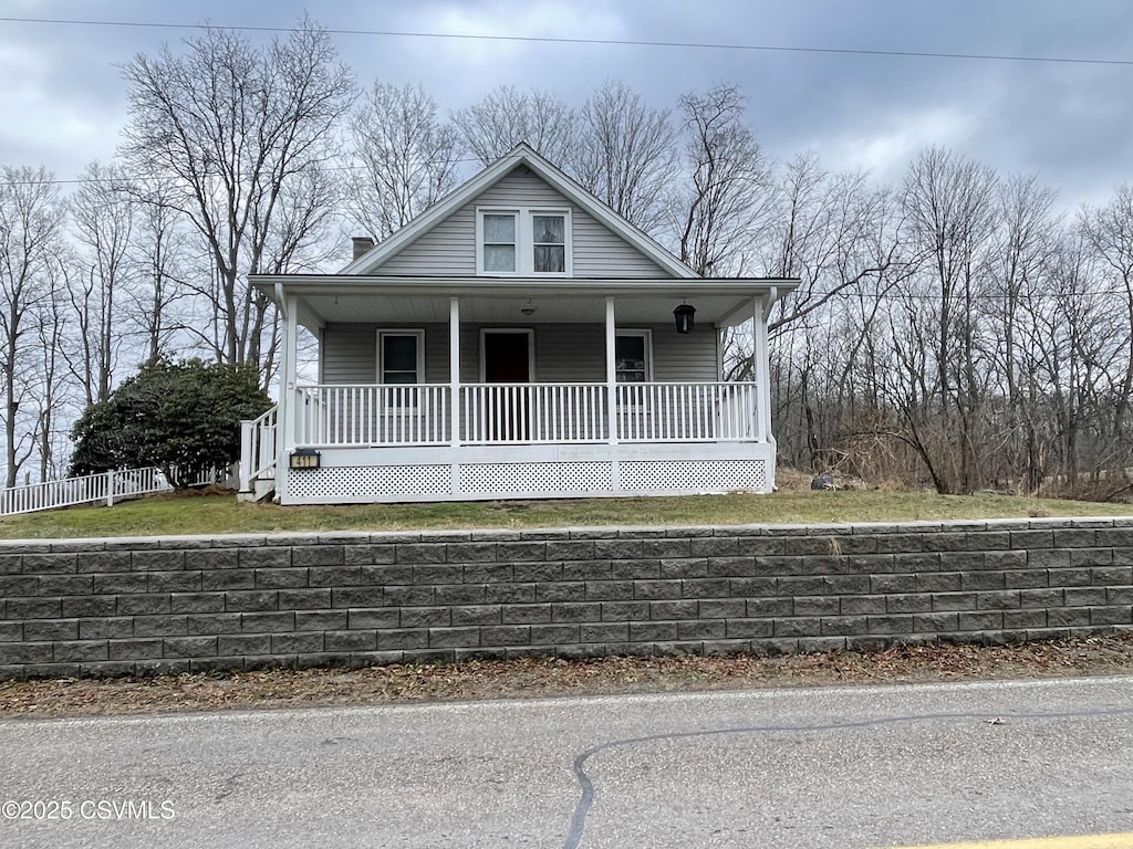 bungalow-style house featuring covered porch