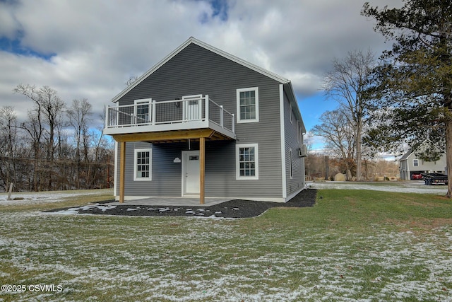 view of front of house with a yard and a patio