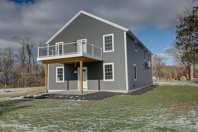 view of front of house featuring a deck, a front lawn, and a patio area