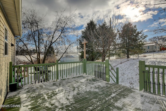 view of snow covered deck