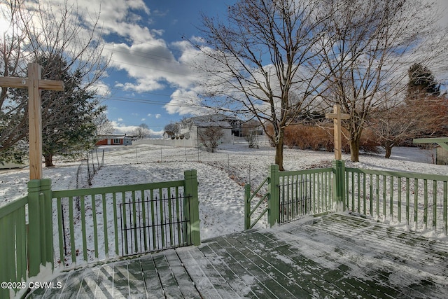 view of snow covered deck