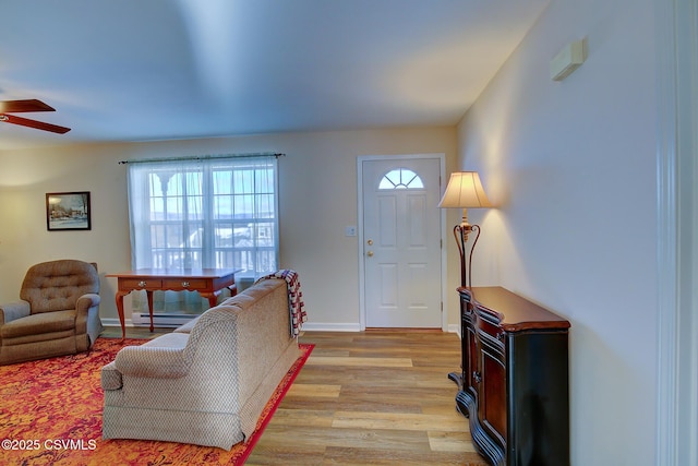 entryway featuring ceiling fan and light hardwood / wood-style flooring