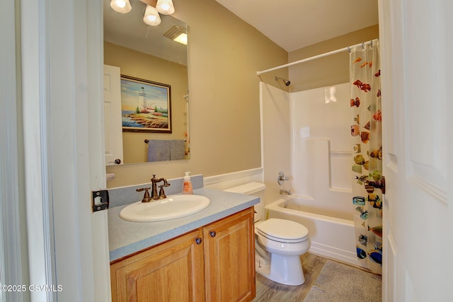 full bathroom with wood-type flooring, vanity, toilet, and shower / bath combo