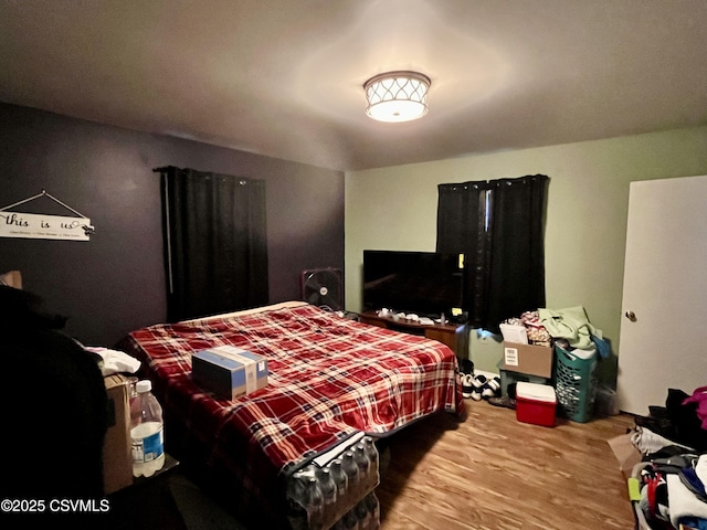 bedroom featuring hardwood / wood-style floors