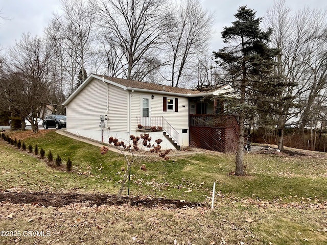 exterior space featuring a front yard