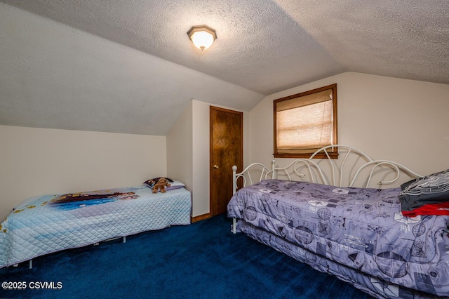 carpeted bedroom featuring vaulted ceiling and a textured ceiling