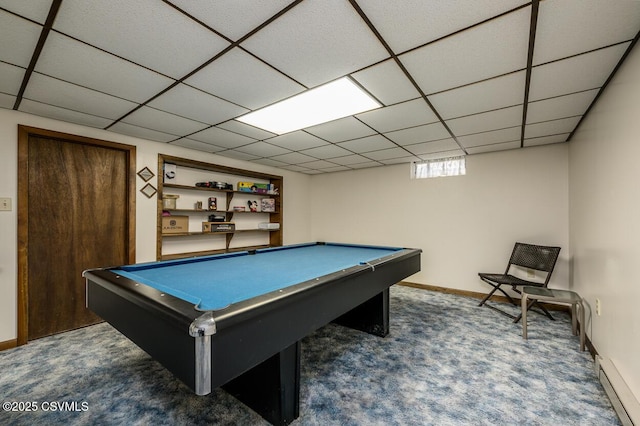 game room with a paneled ceiling, pool table, and dark carpet