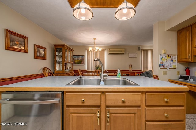 kitchen with decorative light fixtures, a wall mounted AC, dishwasher, sink, and an inviting chandelier