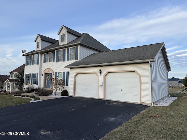 colonial-style house with a garage