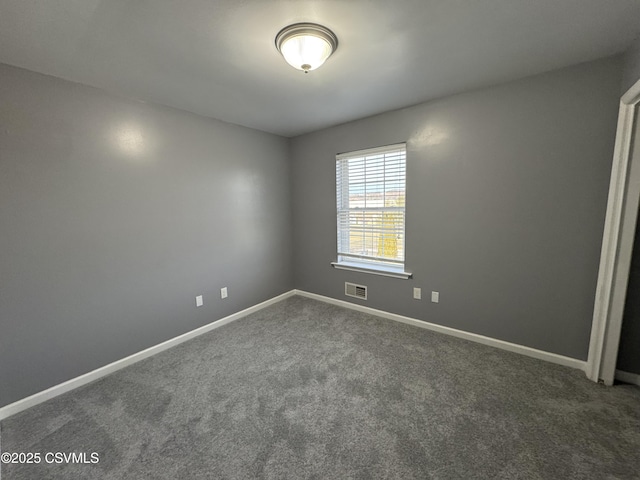 interior space with dark colored carpet