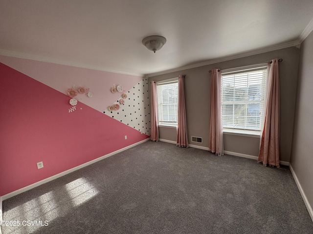 carpeted empty room featuring ornamental molding