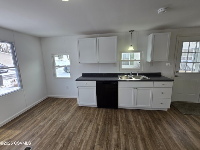 kitchen with sink, white cabinetry, dark hardwood / wood-style flooring, black dishwasher, and pendant lighting