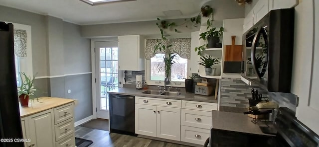 kitchen with tasteful backsplash, sink, dishwasher, dark hardwood / wood-style floors, and white cabinetry