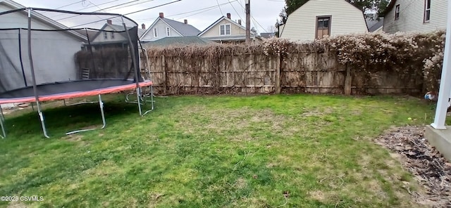 view of yard featuring a trampoline