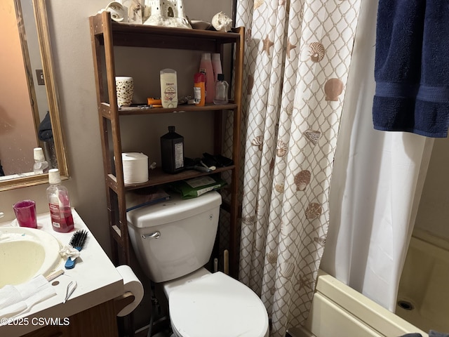 full bathroom with vanity, toilet, and shower / tub combo