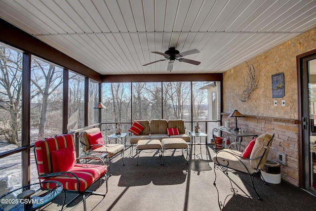 sunroom / solarium with ceiling fan