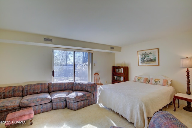 bedroom with carpet and visible vents