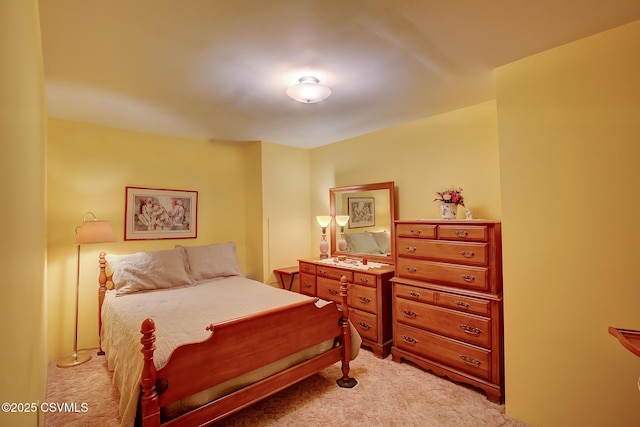 bedroom with light colored carpet