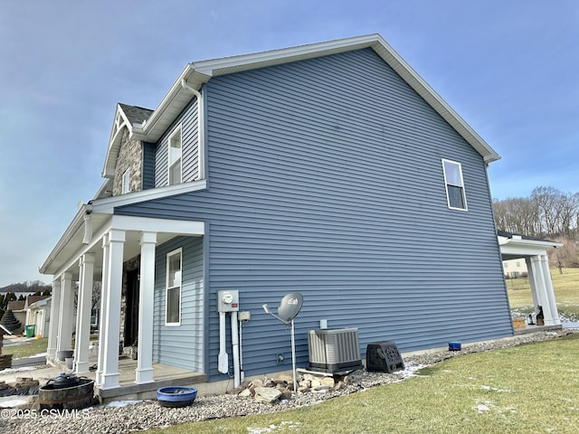 view of home's exterior featuring central AC