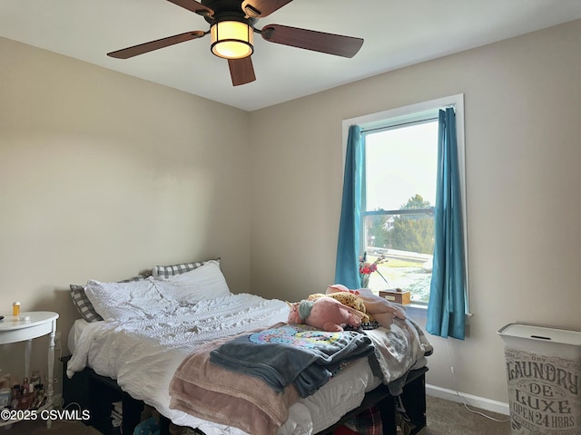 carpeted bedroom featuring ceiling fan