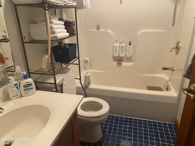 full bathroom with tile patterned flooring, vanity, toilet, and tub / shower combination