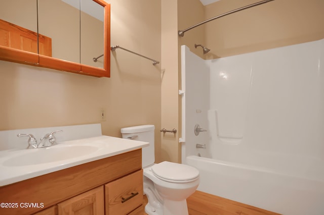 full bathroom with shower / bathtub combination, toilet, and vanity