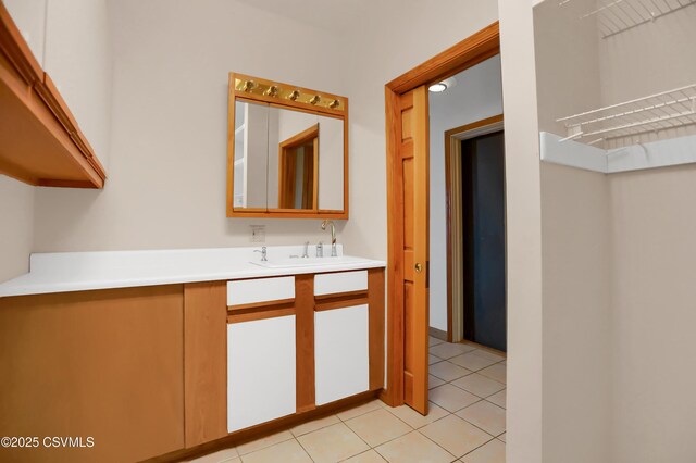 bathroom featuring vanity and tile patterned flooring