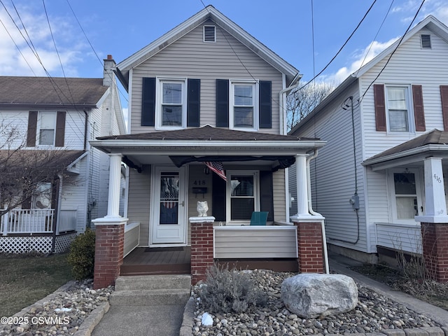 front facade featuring covered porch