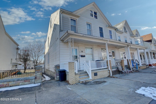 view of front of property featuring covered porch