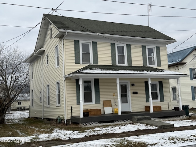 view of property with a porch