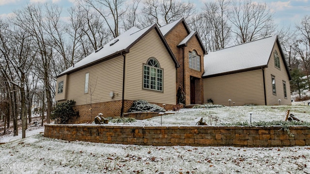 view of snow covered property