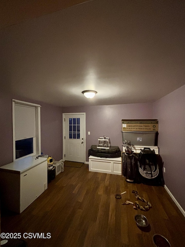 interior space with dark wood-type flooring