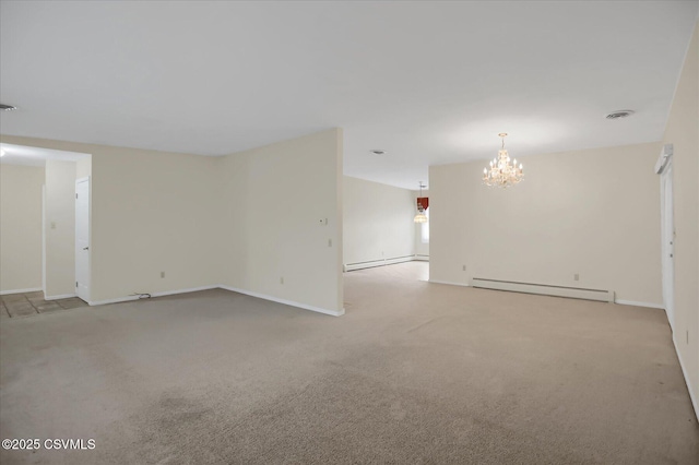 empty room with light carpet, baseboard heating, and a notable chandelier