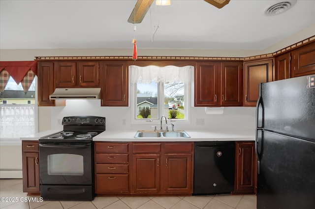 kitchen featuring ceiling fan, sink, black appliances, and light tile patterned flooring