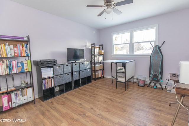 office area with ceiling fan and hardwood / wood-style floors