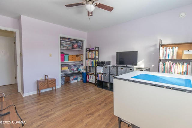 home office featuring ceiling fan and hardwood / wood-style flooring