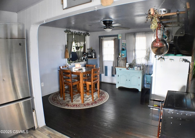 dining room featuring ceiling fan and hardwood / wood-style flooring