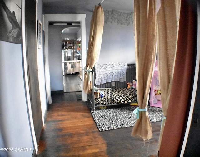 hallway featuring dark wood-type flooring