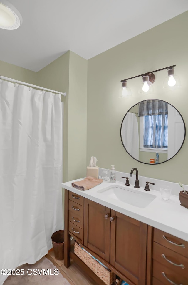 bathroom with tile patterned floors and vanity