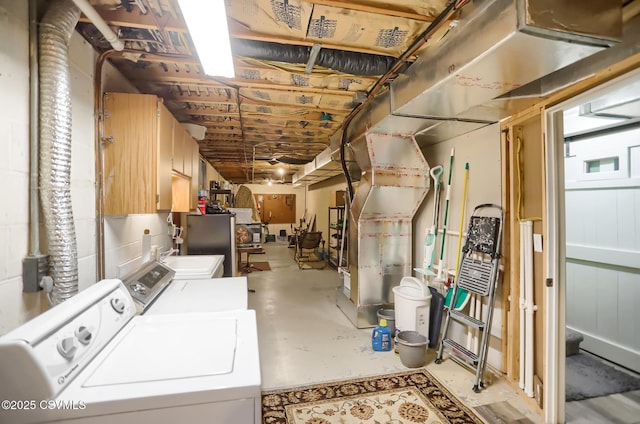 basement featuring sink and washing machine and clothes dryer