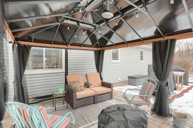 interior space featuring a gazebo and outdoor lounge area