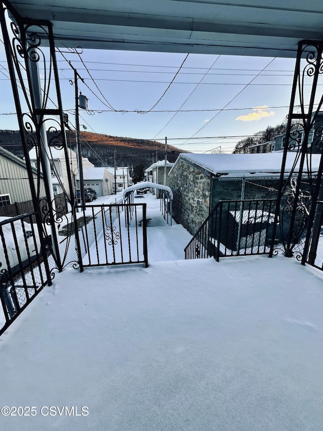 view of snow covered deck