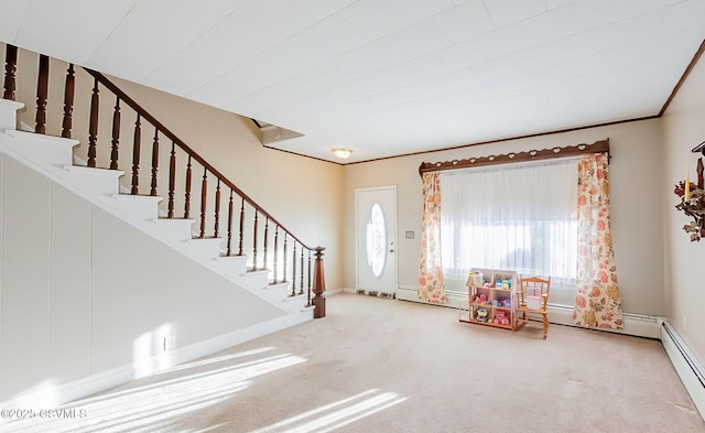 entryway featuring carpet flooring and baseboard heating