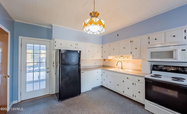 kitchen with pendant lighting, sink, white appliances, and white cabinetry