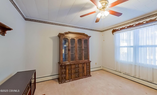 interior space with ornamental molding, ceiling fan, and baseboard heating