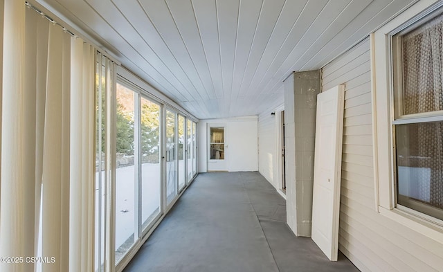 hall featuring wood ceiling