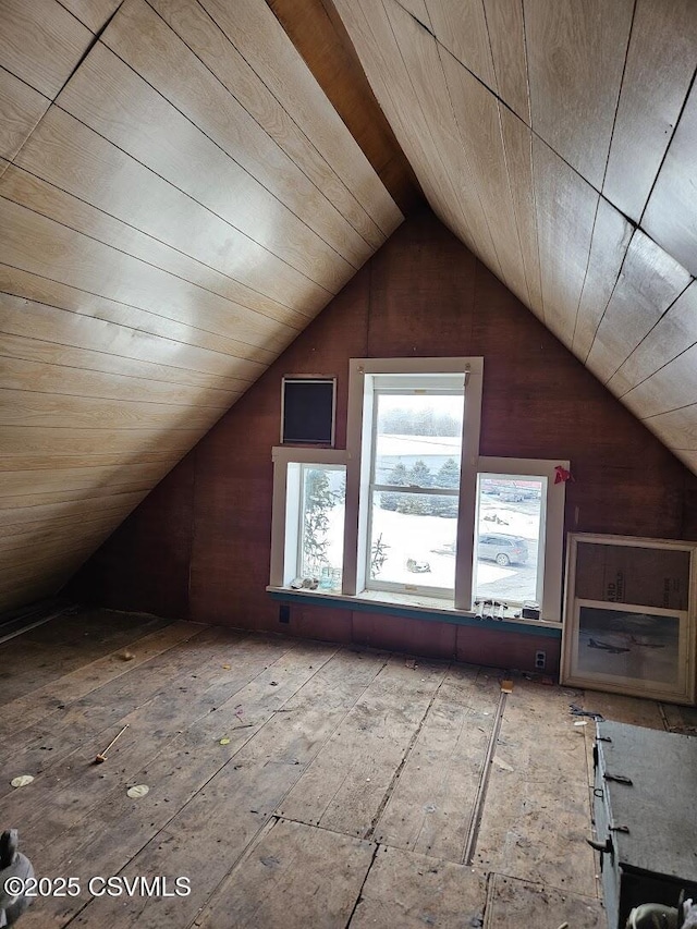 bonus room with wood ceiling and vaulted ceiling