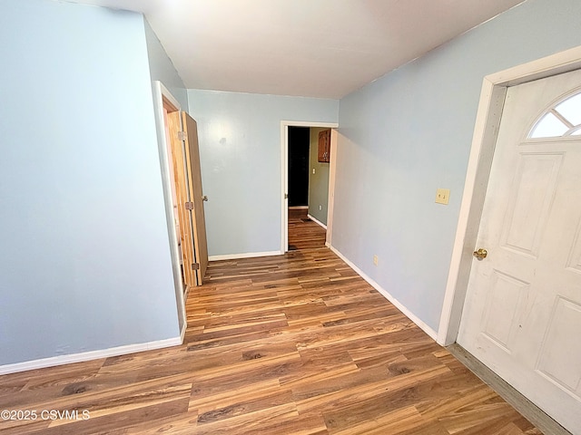 hall featuring dark wood-type flooring